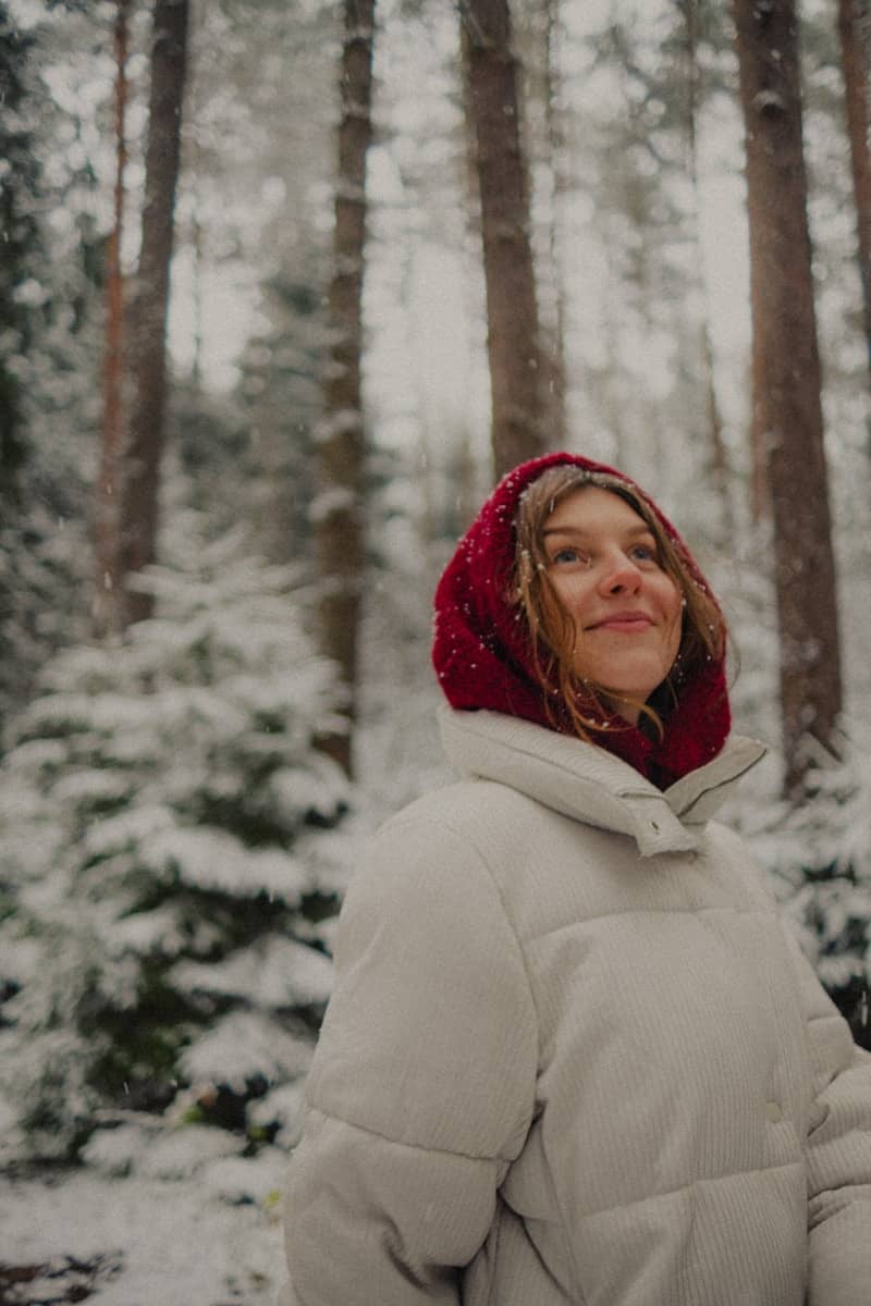 Young woman in a snowy forest