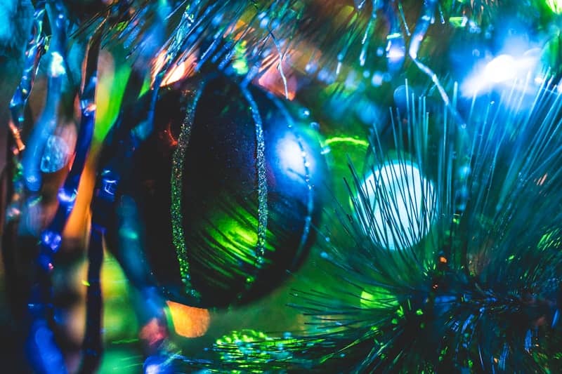 A close up of a christmas tree with ornaments