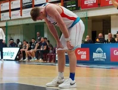 Tucker looking down at the court