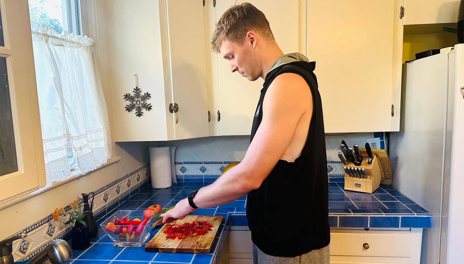 Tucker chopping vegetables