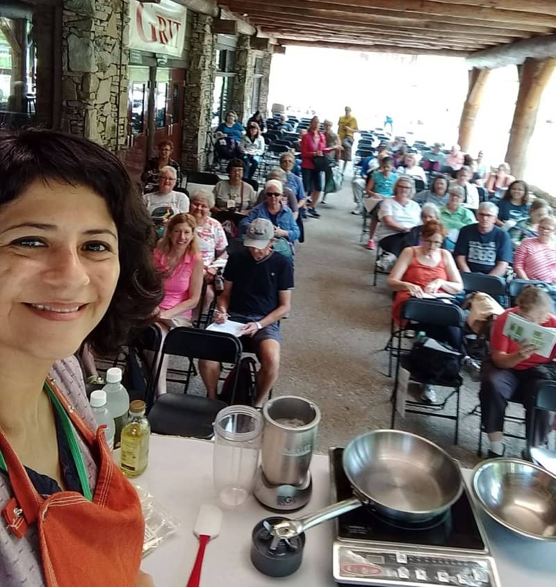 claudia lucero leading a cheesemaking demonstration in pennsylvania