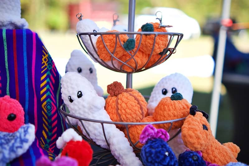 A basket filled with stuffed animals sitting on top of a table