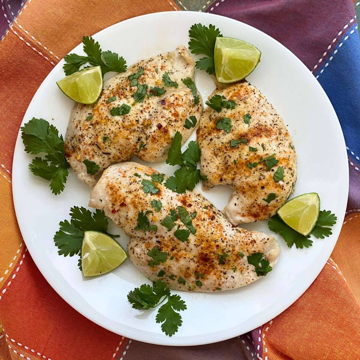 Chili lime chicken on a white plate.
