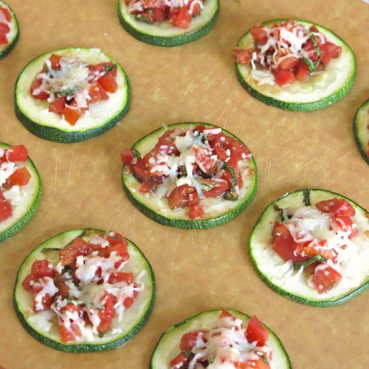 Zucchini bruschetta on a cutting board.