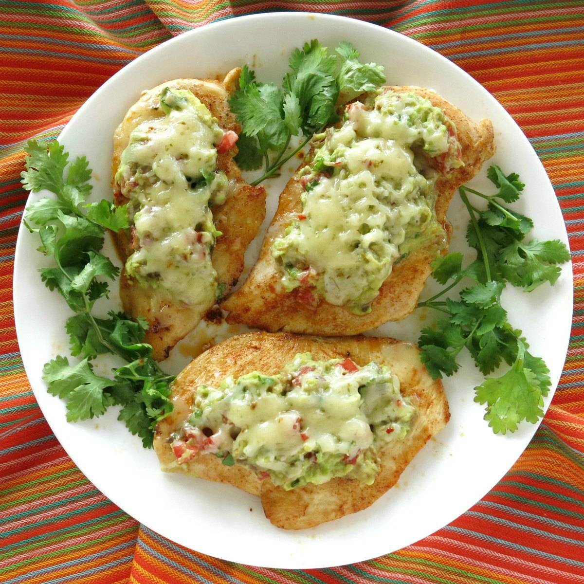 Guacamole chicken on a plate.