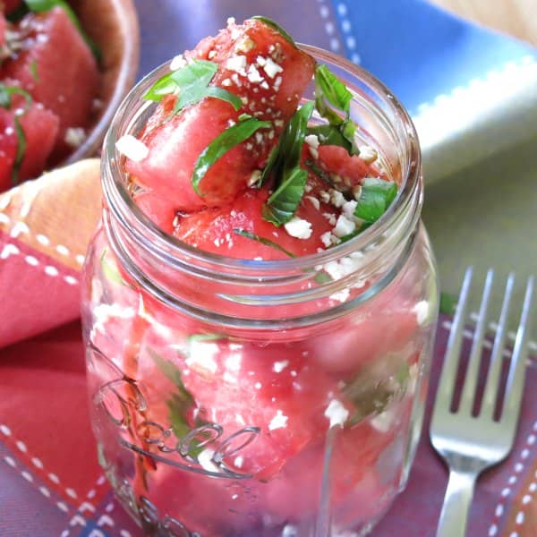 Watermelon salad in a mason jar.