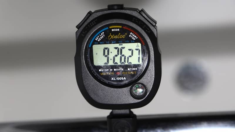 a close up of a stopwatch on a car