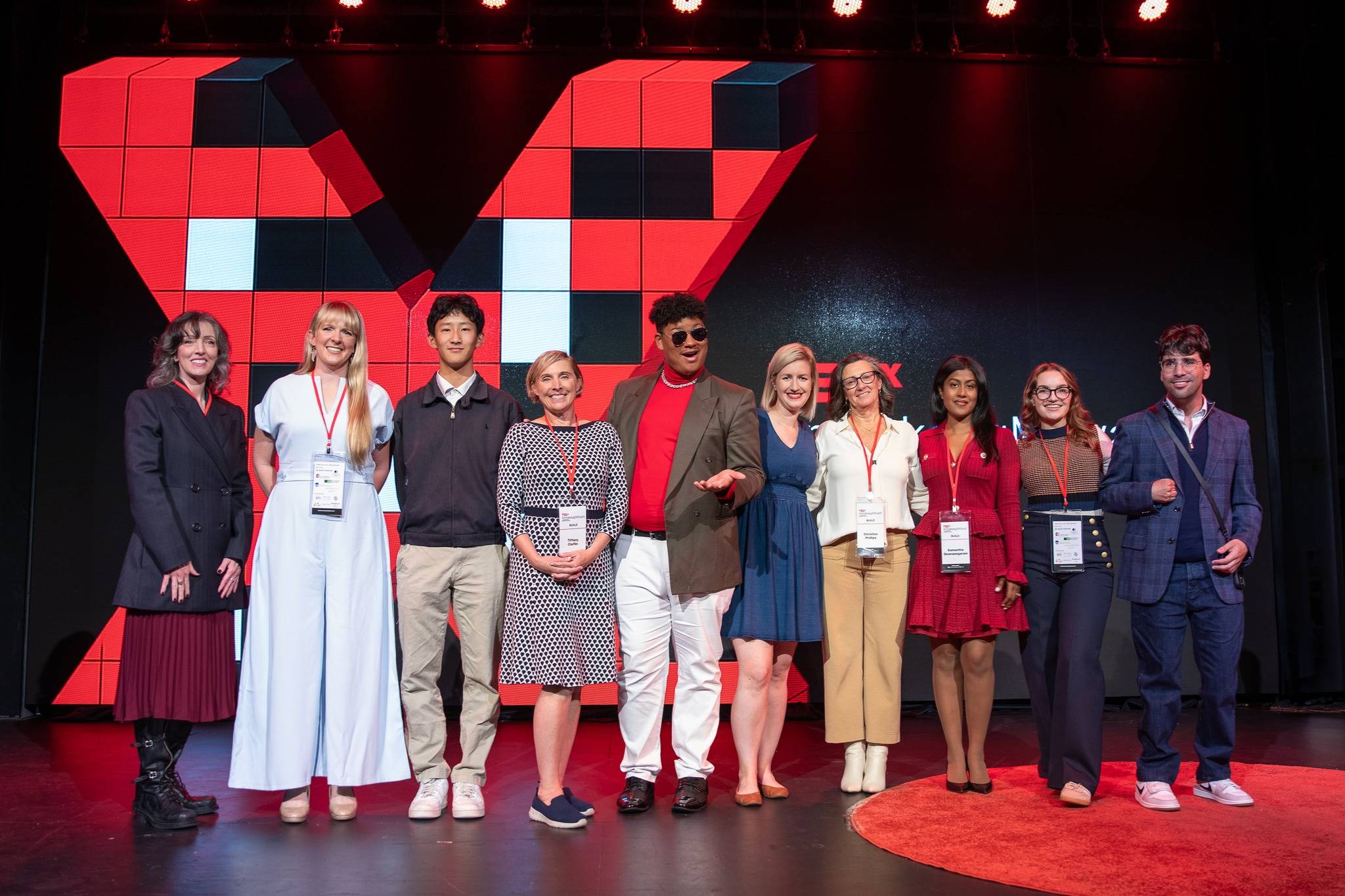 The speakers of TEDxAmoskeagMillyard in Manchester, New Hampshire during the October, 2025 TEDx event. 