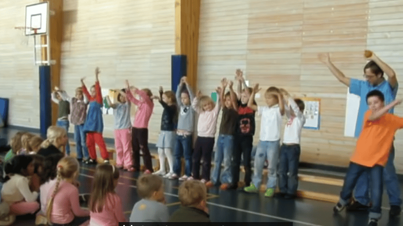 Kids performing a FunSongs action song