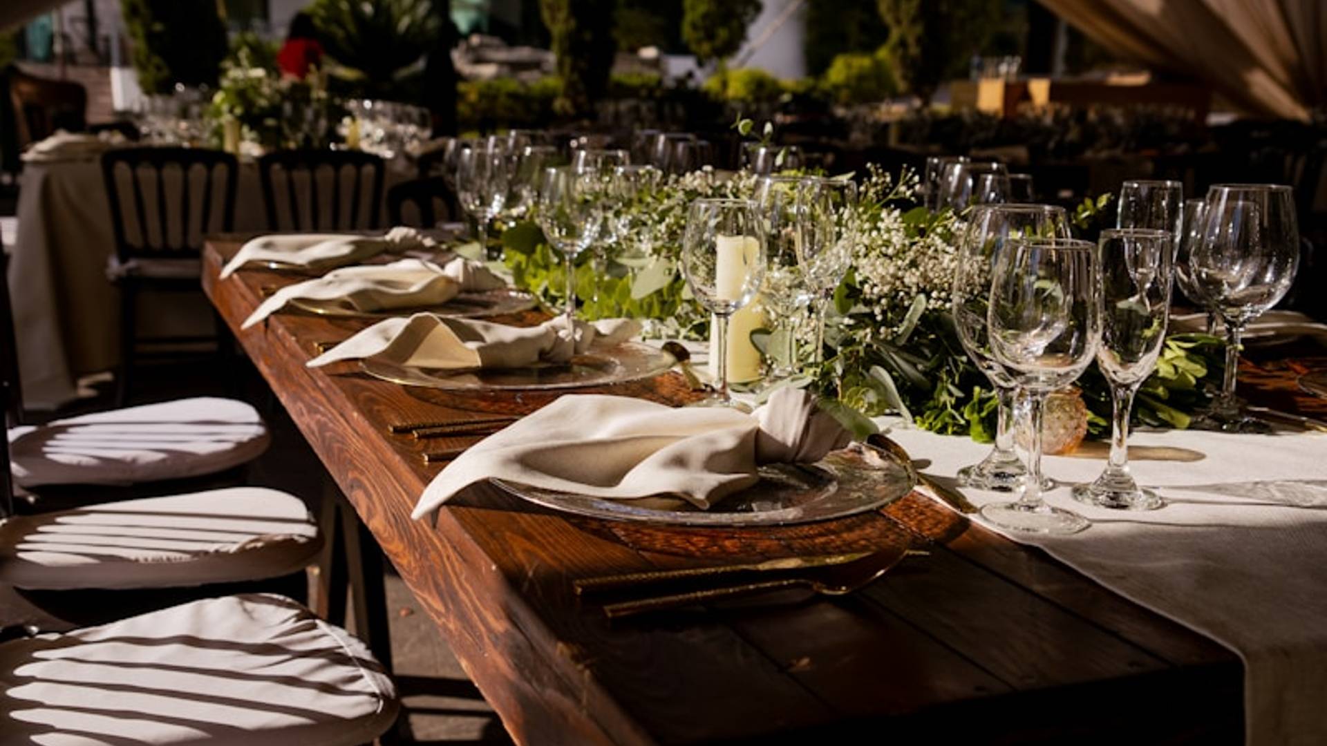 A beautifully set table is ready for a meal.