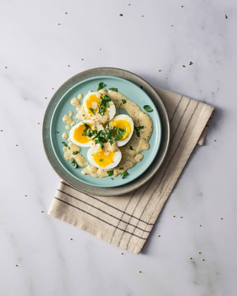 a plate of food with eggs on top of it