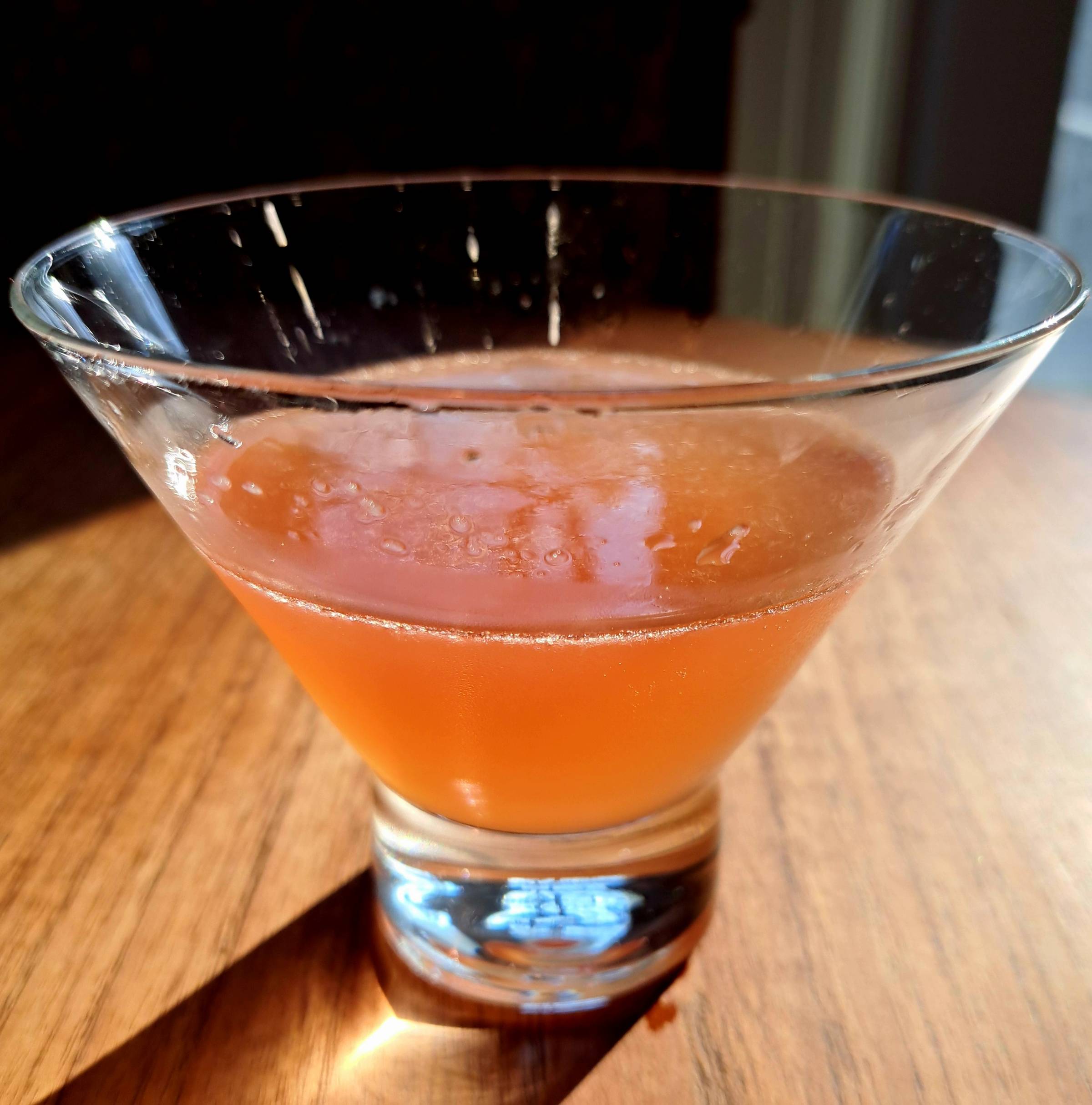 The Velvet Abbey cocktail is a gin-based sour that combines Chambord, B&B, and lemon juice for a balanced mix of raspberry, herbal, and citrus flavors.