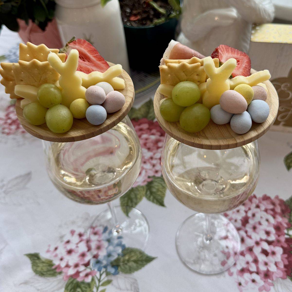 Easter charcuterie wine toppers with prosciutto roses