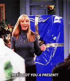 GIF of someone dancing saying they have a present