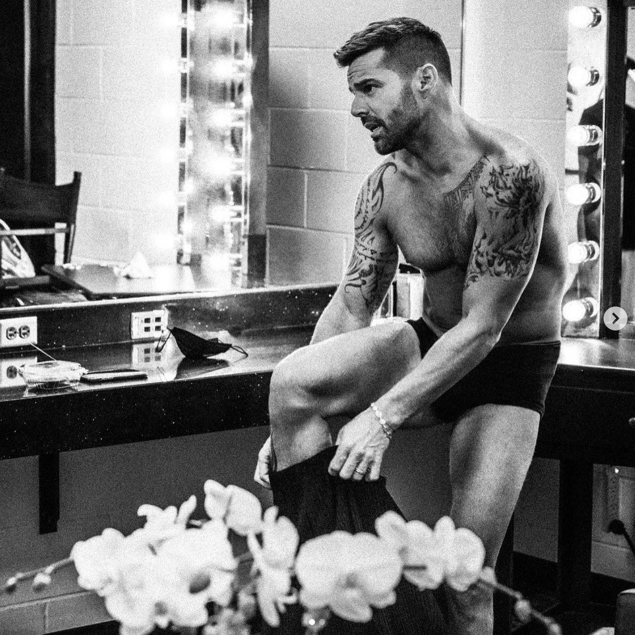 ricky martin in a dressing room in his underwear