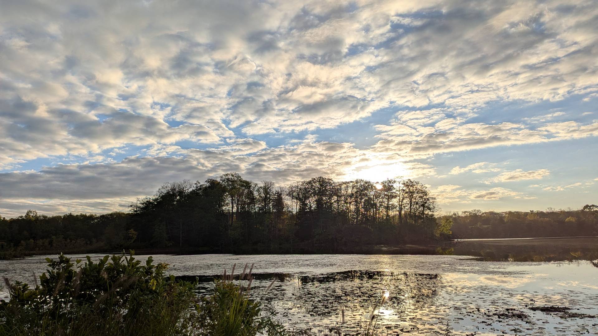 sunrise over a picturesque lake in upstate New York