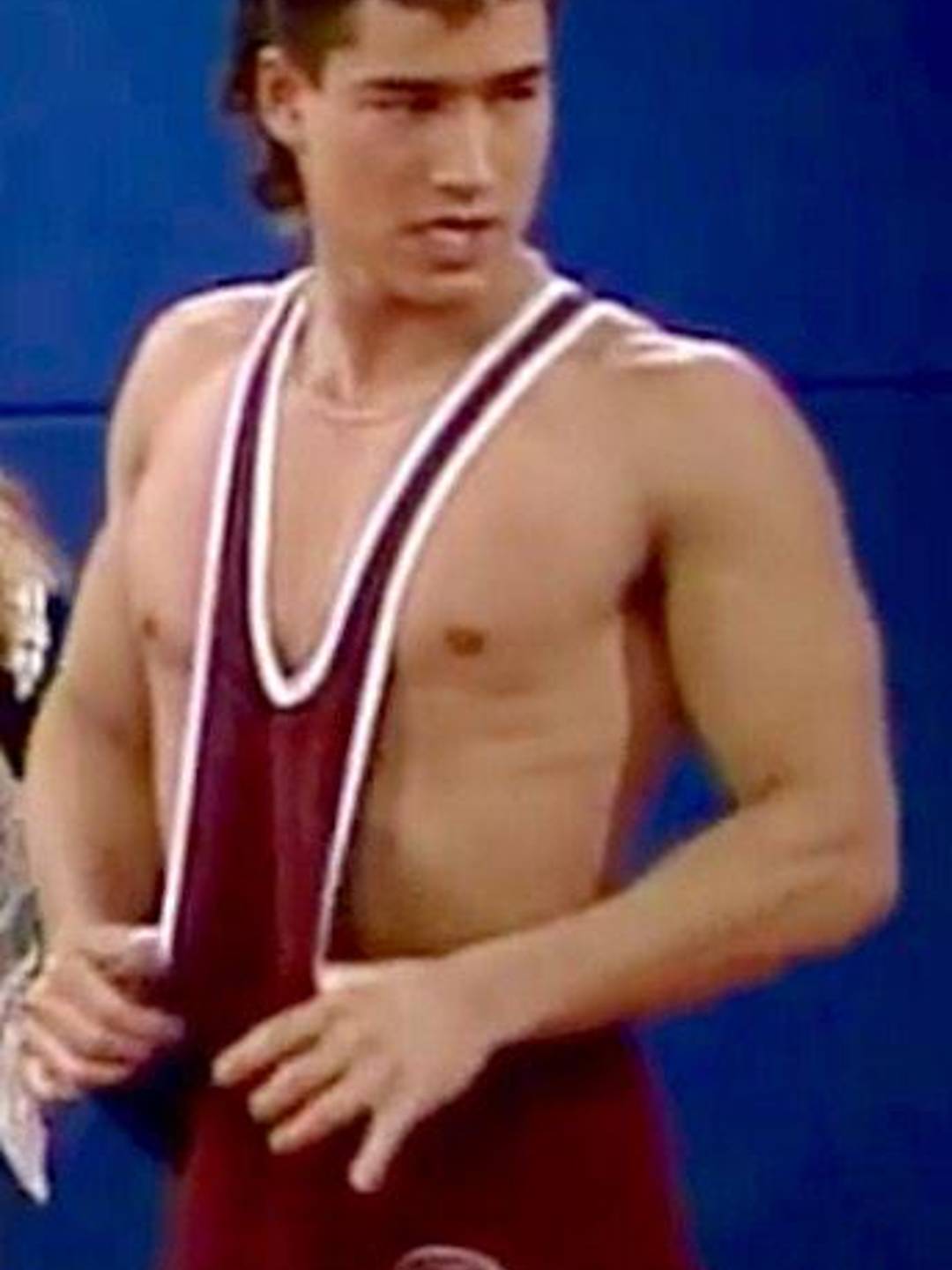muscular wrestler in a singlet