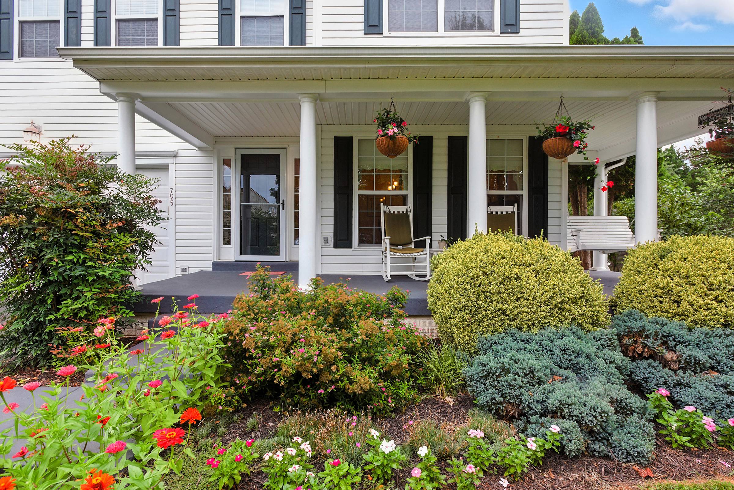 Beautiful porch with rocking chairs and flowers in Culpeper VA