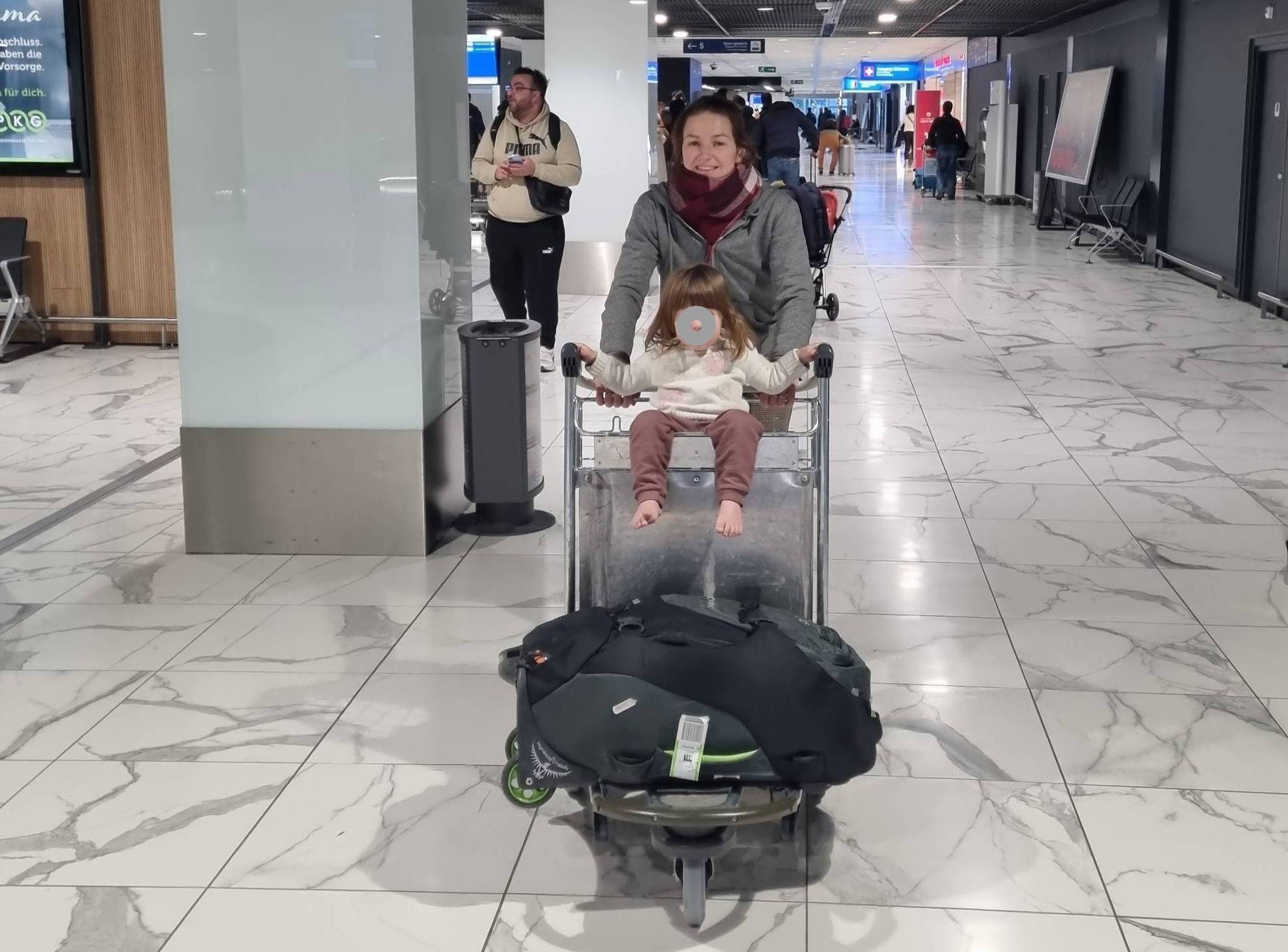Aurelie and Cleo at the airport