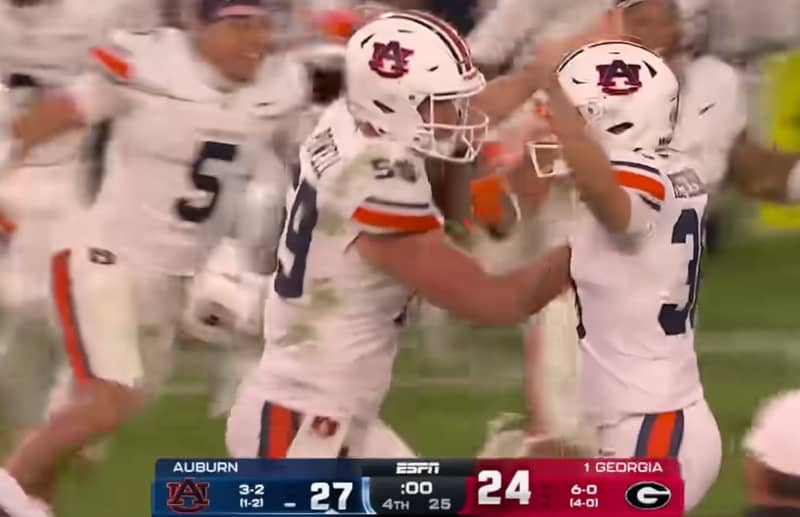 Auburn players celebrate beating No. 1 Georgia.
