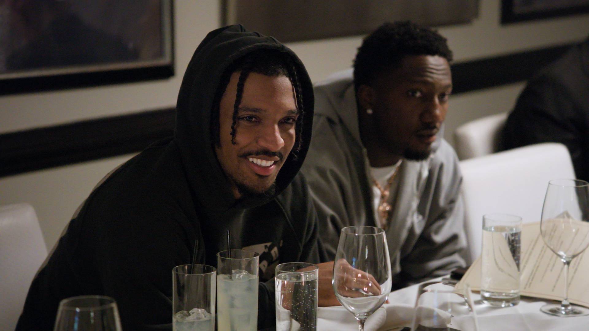 Jayden Daniels (L) in a still from "Quarterback" season three. (Netflix.)