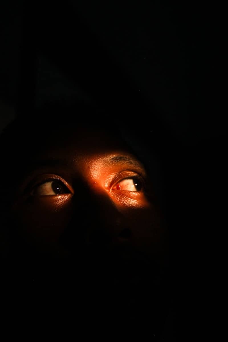 Close-up of a person's eyes looking upwards
