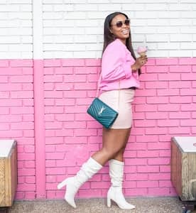 Photo by <a href="https://unsplash.com/@0514design?utm_source=unsplash&utm_medium=referral&utm_content=creditCopyText">Tahiti Spears</a> on <a href="https://unsplash.com/photos/woman-in-pink-long-sleeve-shirt-and-blue-denim-daisy-dukes-standing-beside-whi