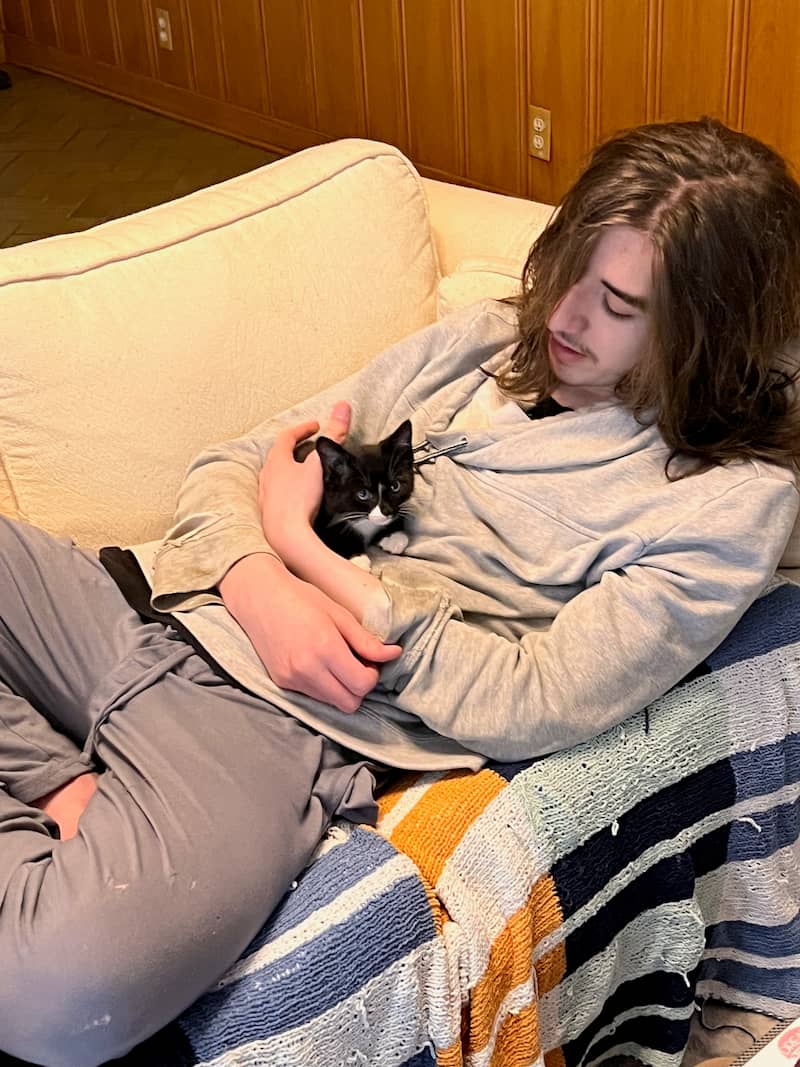 picture of my son with the new little kitten, Coty