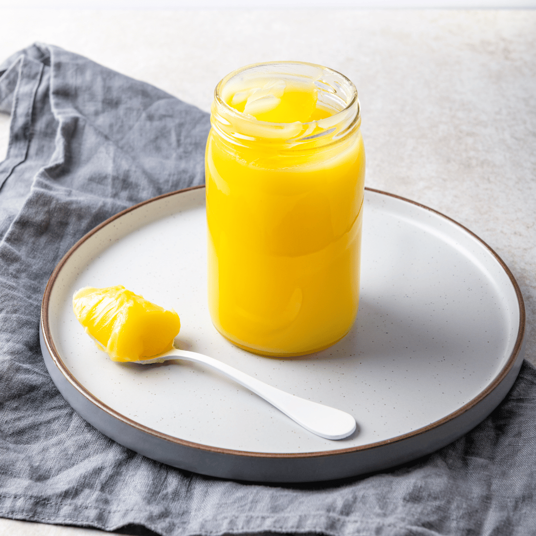 yellow lemon fruit in brown wooden bucket