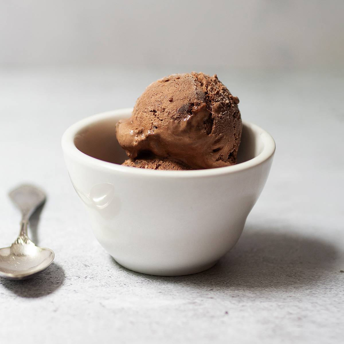 A homemade bowl of no churn chocolate ice cream.
