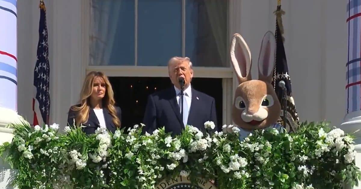 President Trump giving a speech as the Easter Bunny looks on.