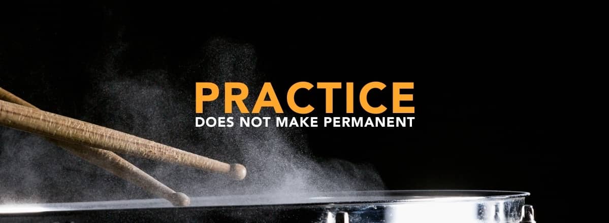 Drum sticks hitting a snare drum with chalk dust flying in the air. Text over the image reads "Practice does not make permanent"