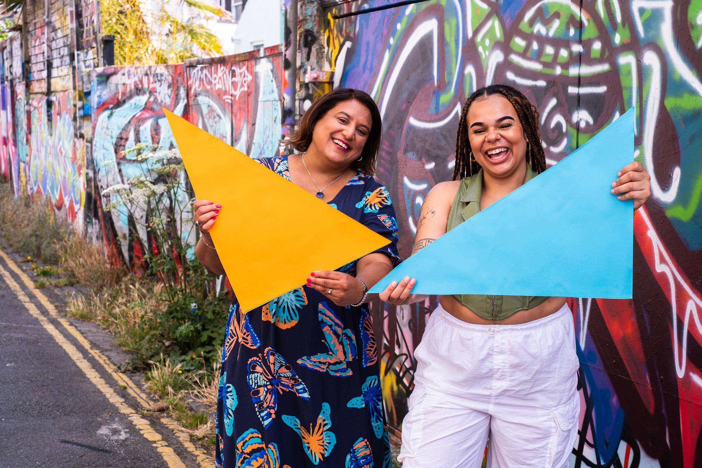 Mo and Kaia with coloured triangles