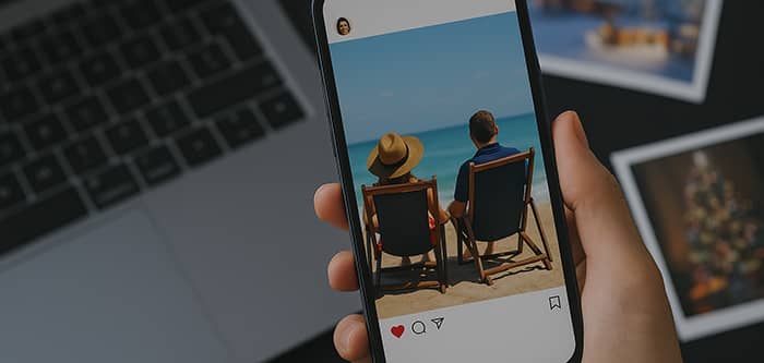 Social media post of a couple on vacation, possibly revealing information that can be used to scam them or their family.