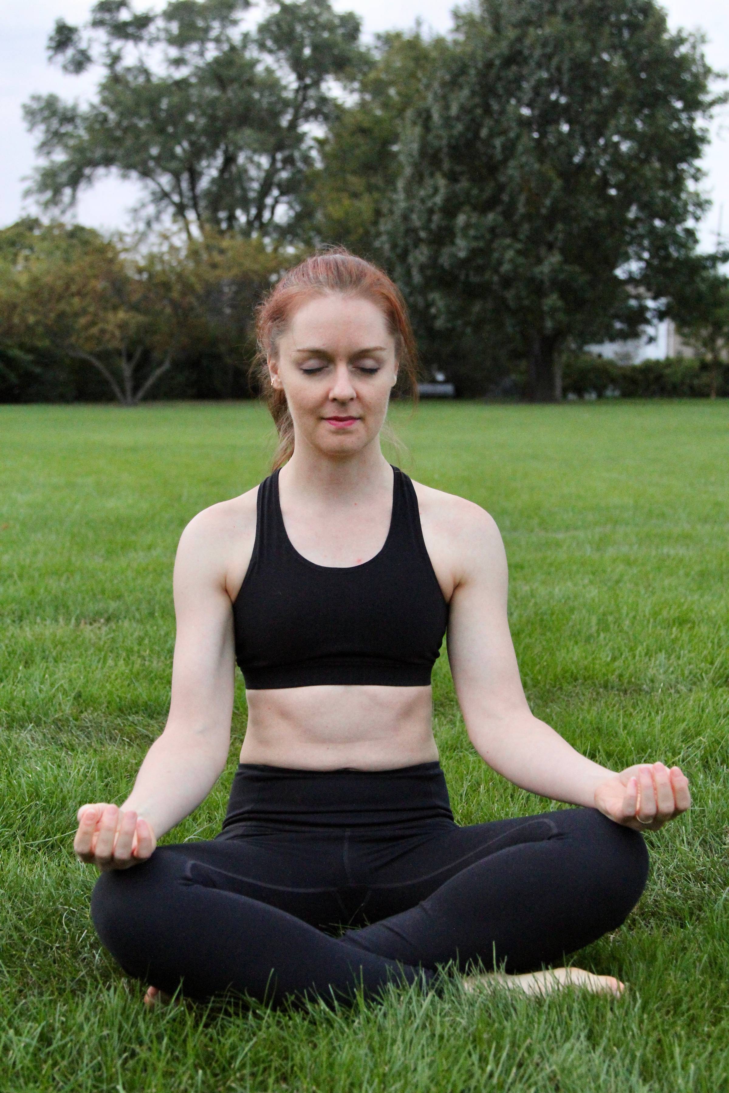 photo of gel candle on board beside pillow