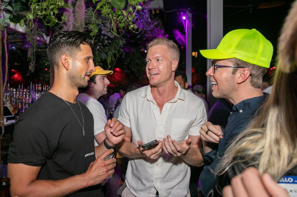 candid photo of Sahil, Sam, and Nick Gray at their event in New York City