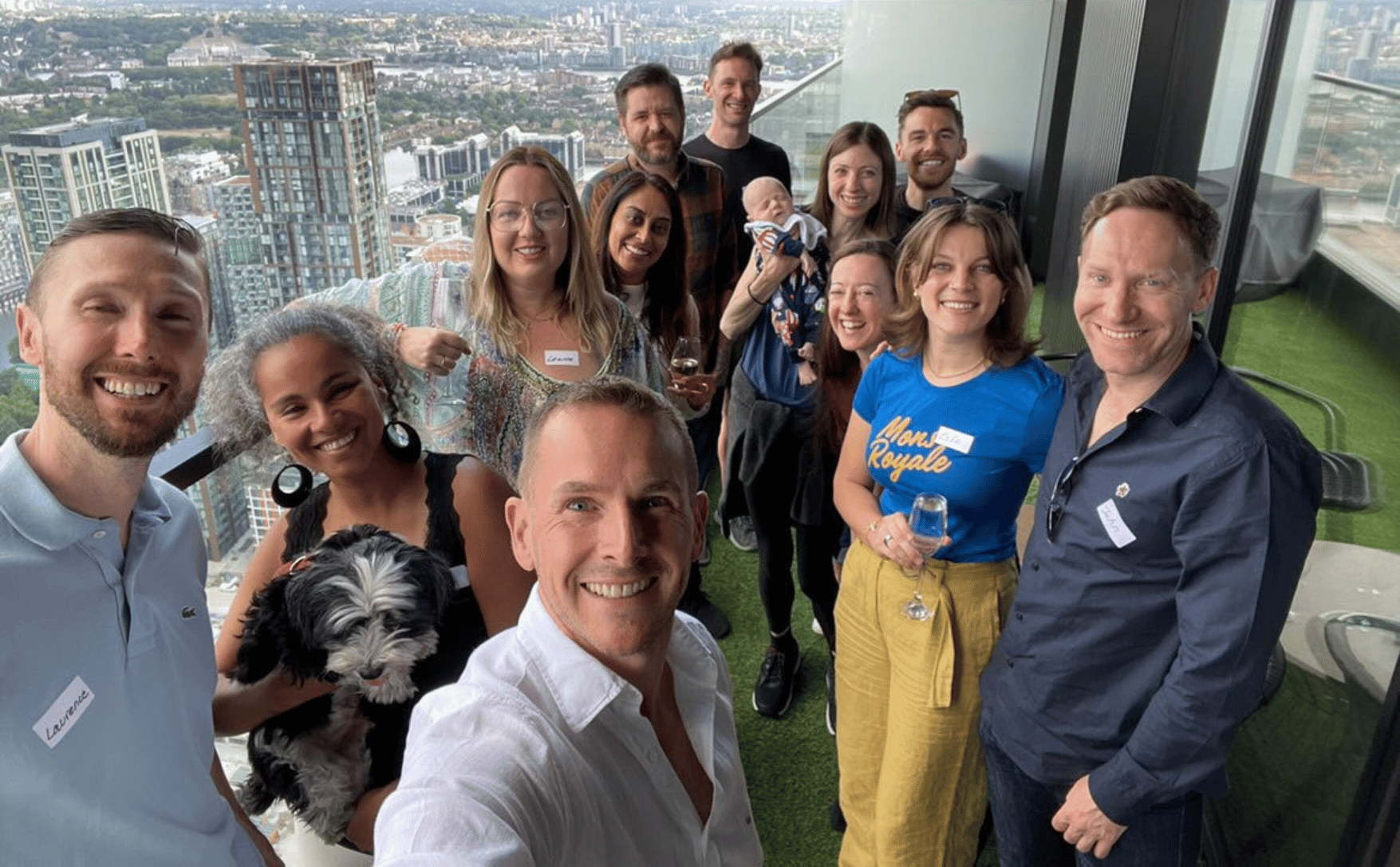 group party photo in London balcony