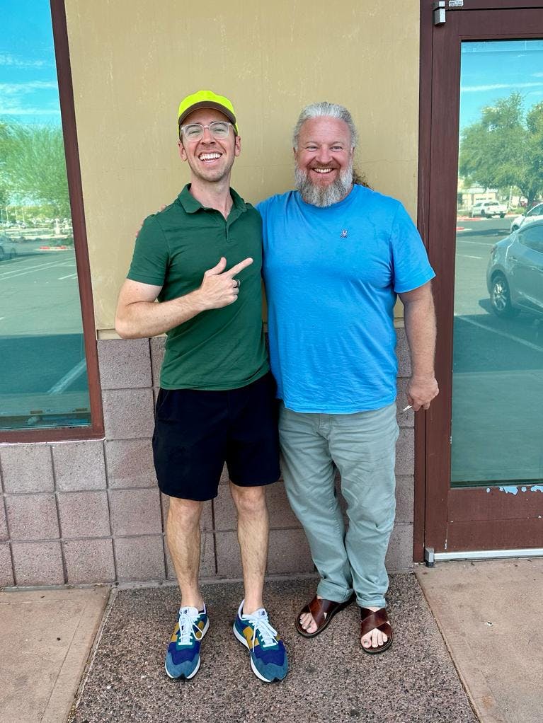 A photo of Nick Gray and one of his readers in Tempe Arizona