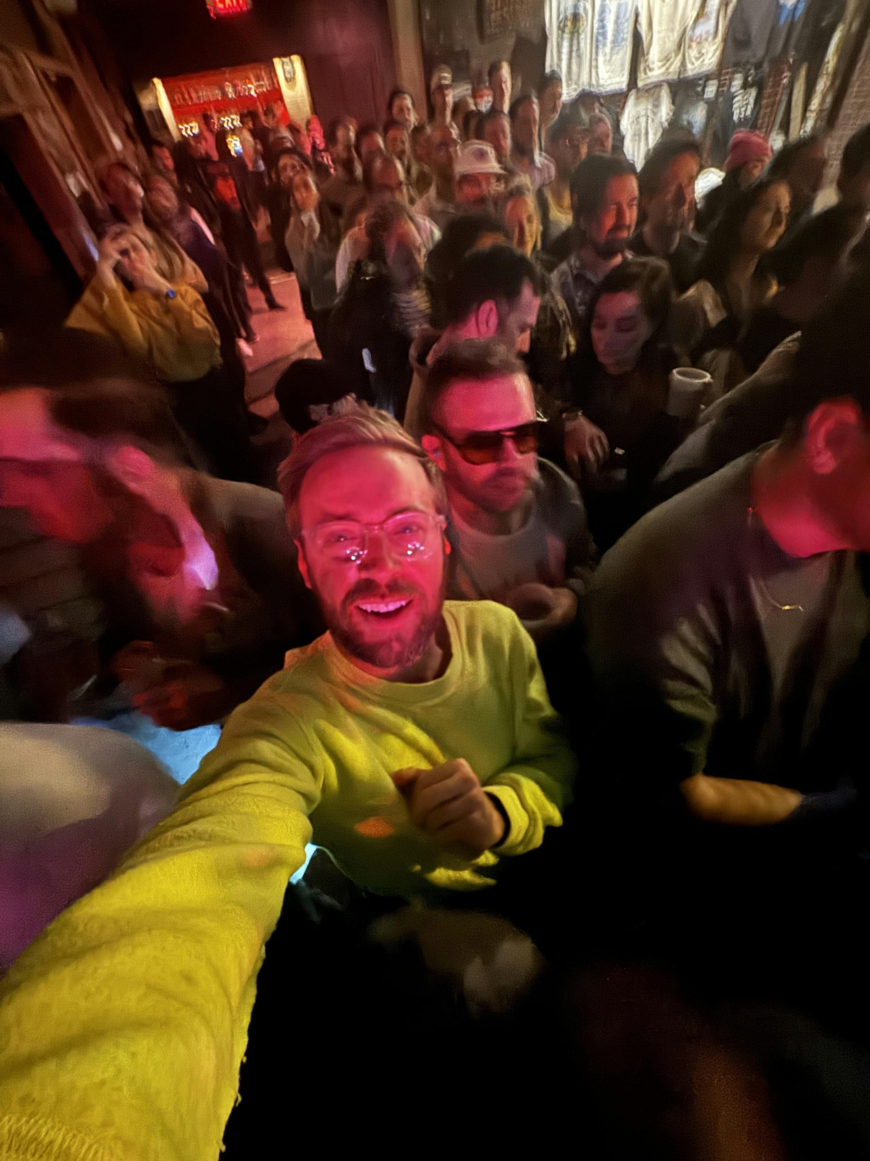 A selfie photo of Nick Gray in the middle of the crowd