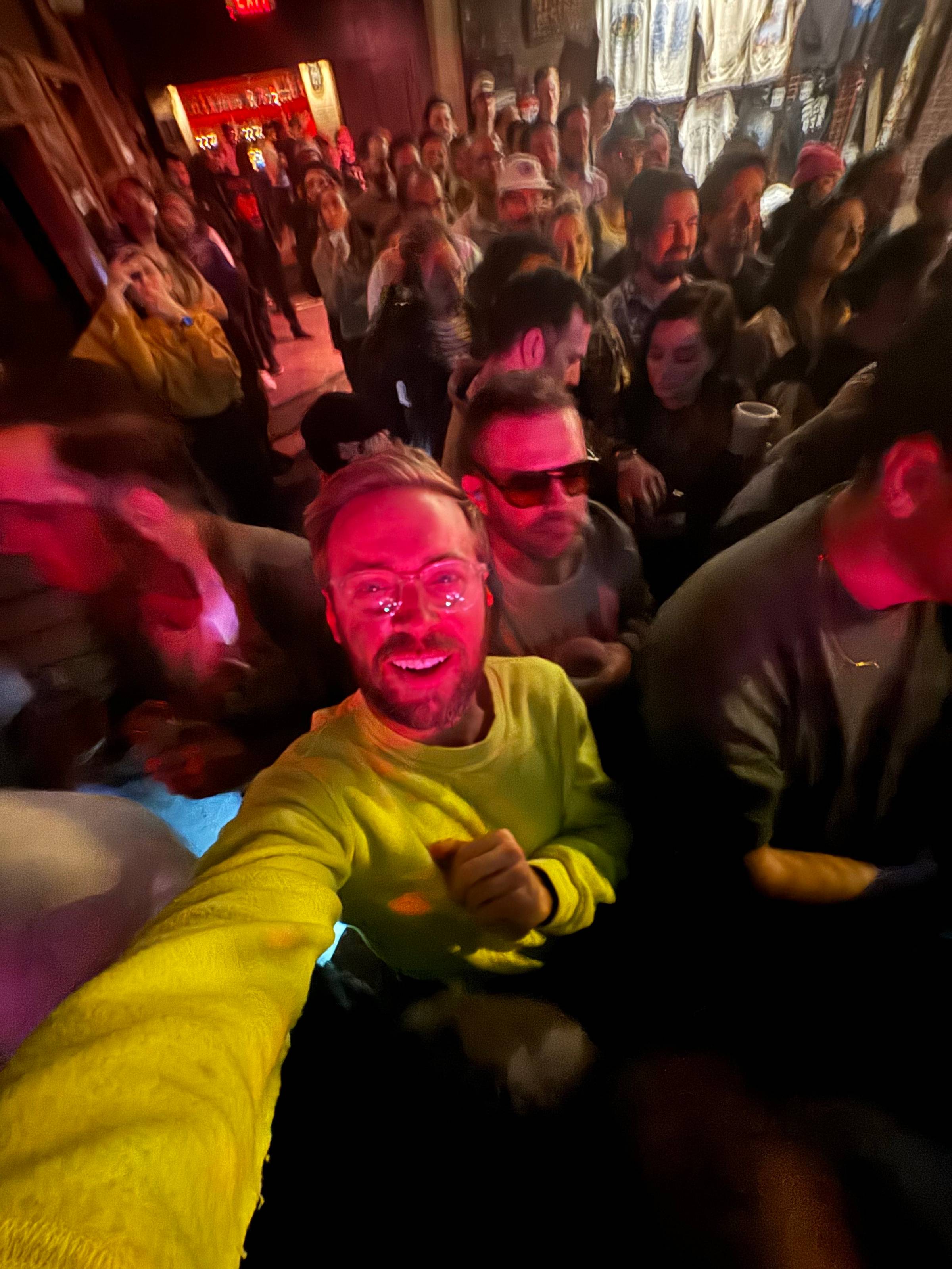 A selfie photo of Nick Gray in the middle of the crowd