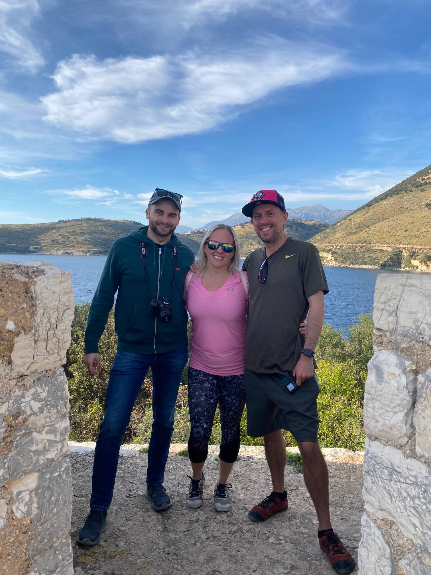 An image of Rachel, Sasha, and Pshemek exploring a 13th-century castle in Southern Albania