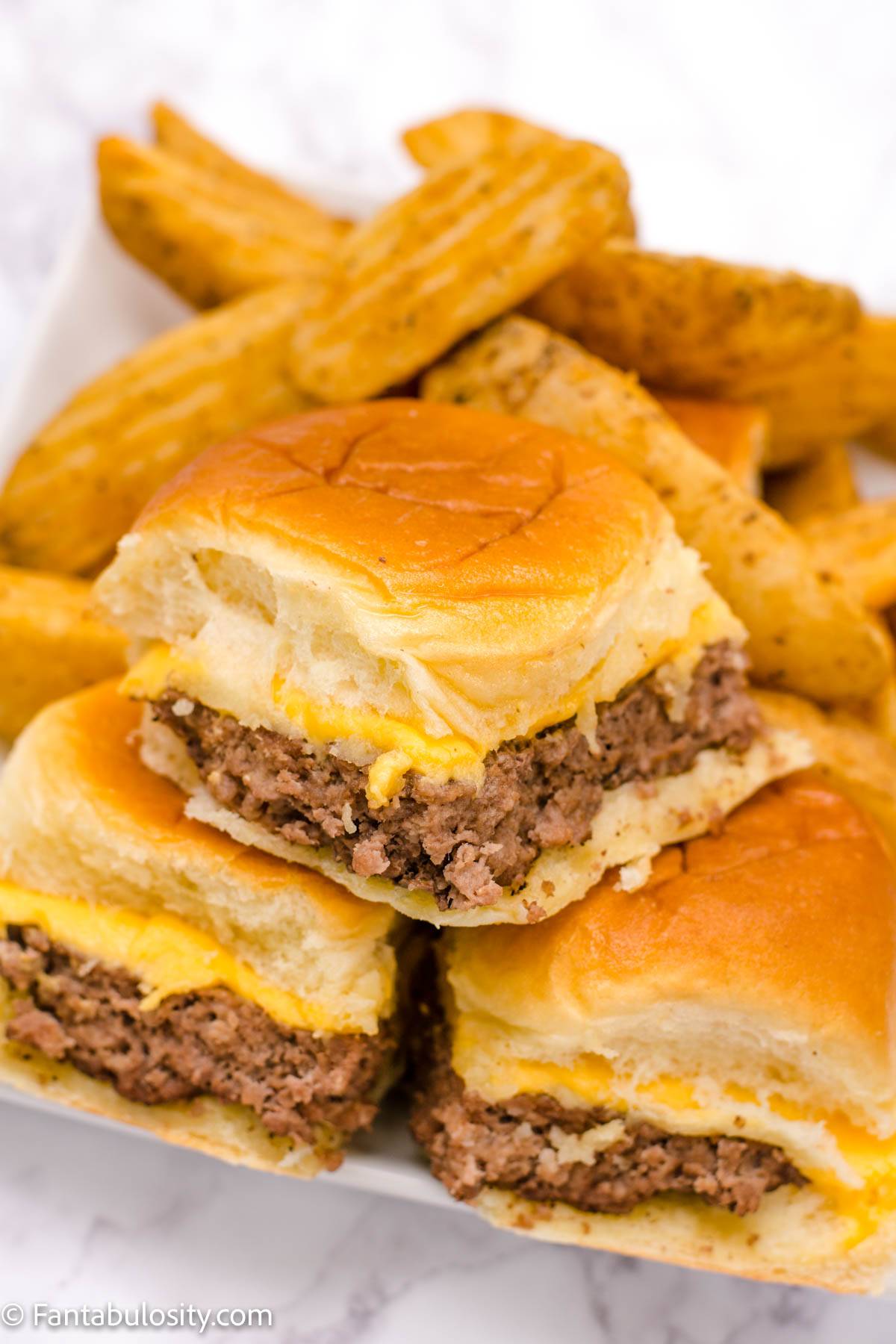 Close up of cheeseburger sliders.