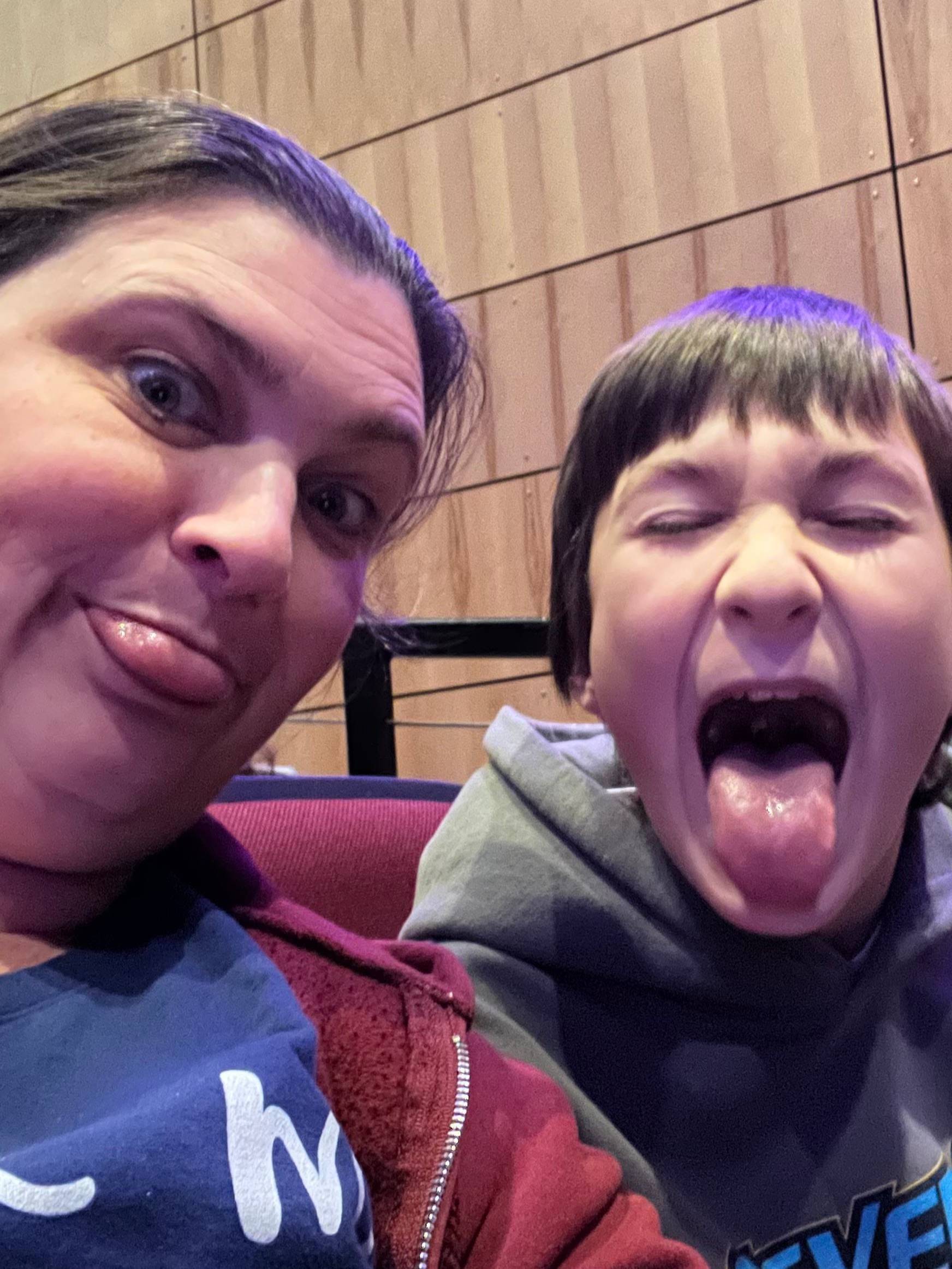 Mom and teen son being silly