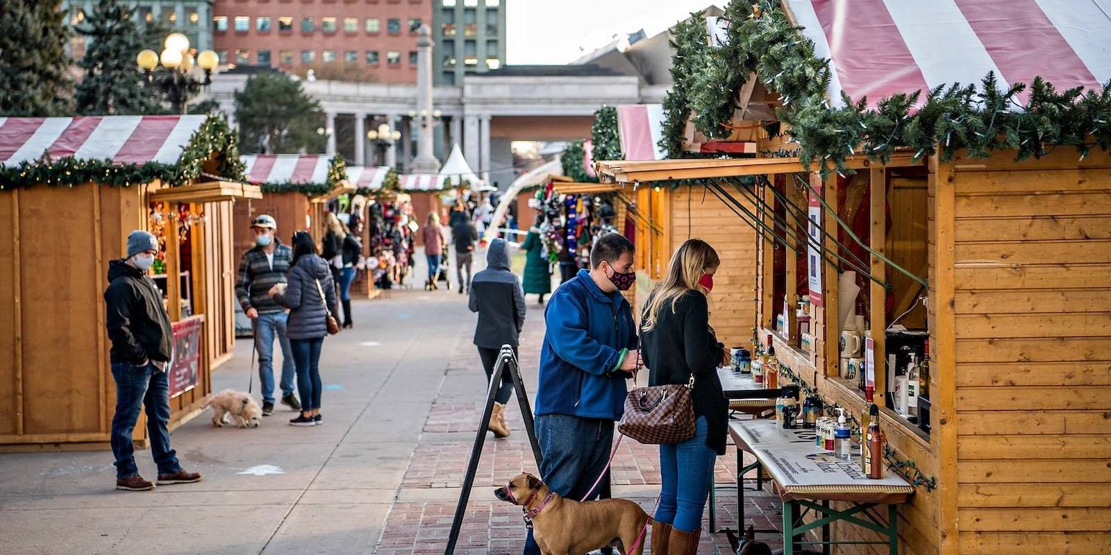 people shop at vendors for the Denver Christkindlmarket