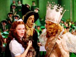 Dorothy and the Scarecrow are puzzled to hear that she "always had the power" to go home to Kansas from the witch Glinda