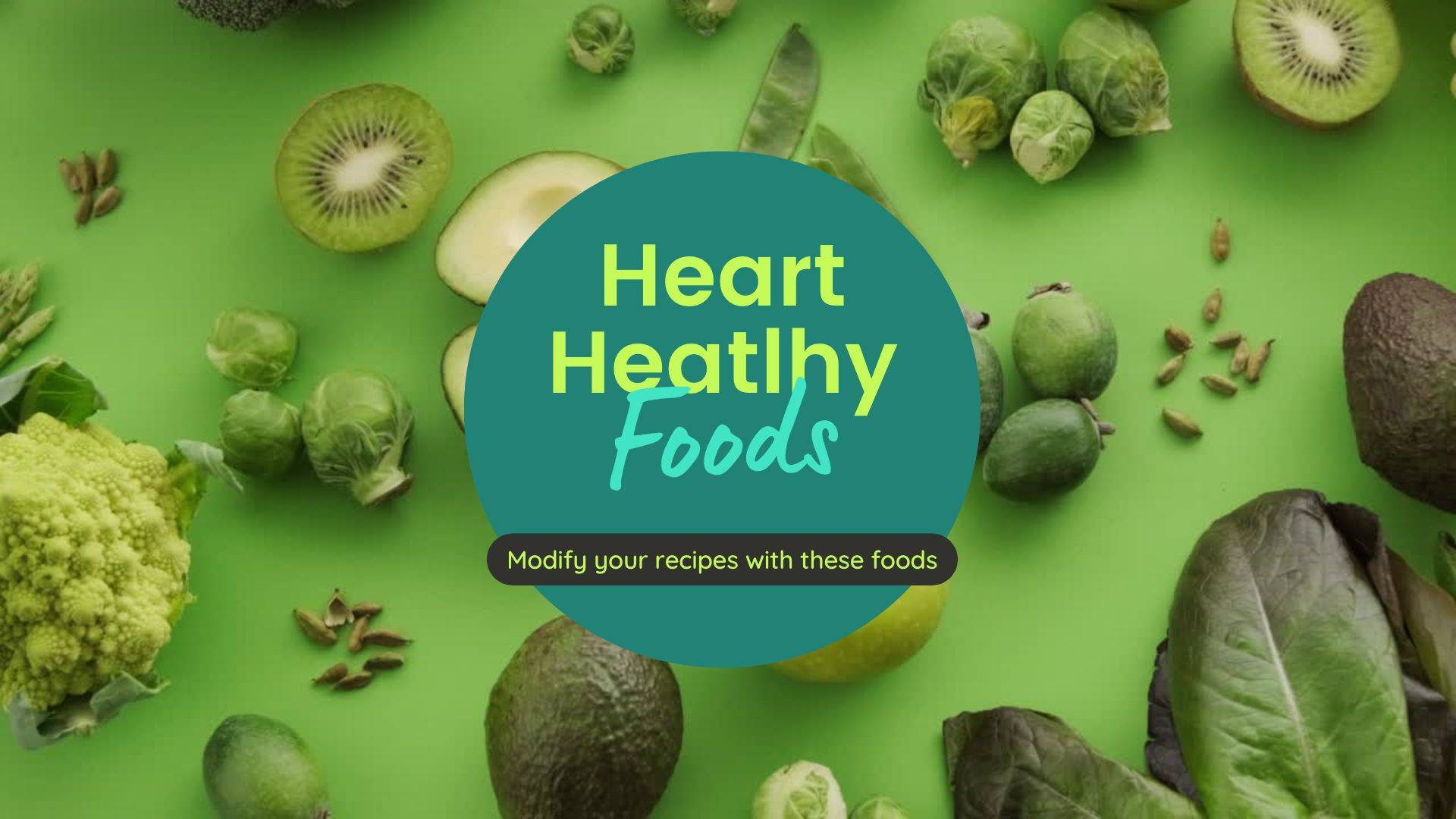 green fruits and vegetables spread out on a green background showing heart healthy foodsd