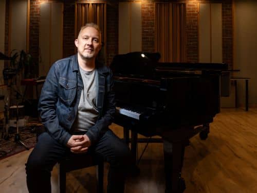 EASY JAZZ Spotlight Interview with GRAMMY/JUNO Award-Winning Jazz Record Label Owner/Produce/Saxophonist Cory Weeds shown at the piano.