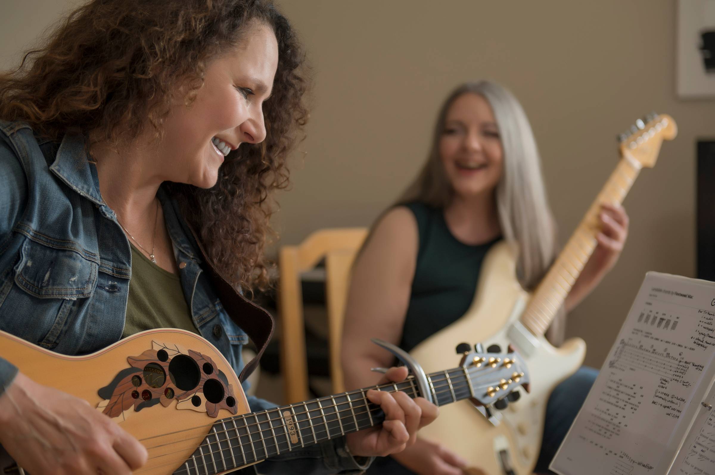 Guitar student Megan Fleming with instructor Kerilie McDowall.