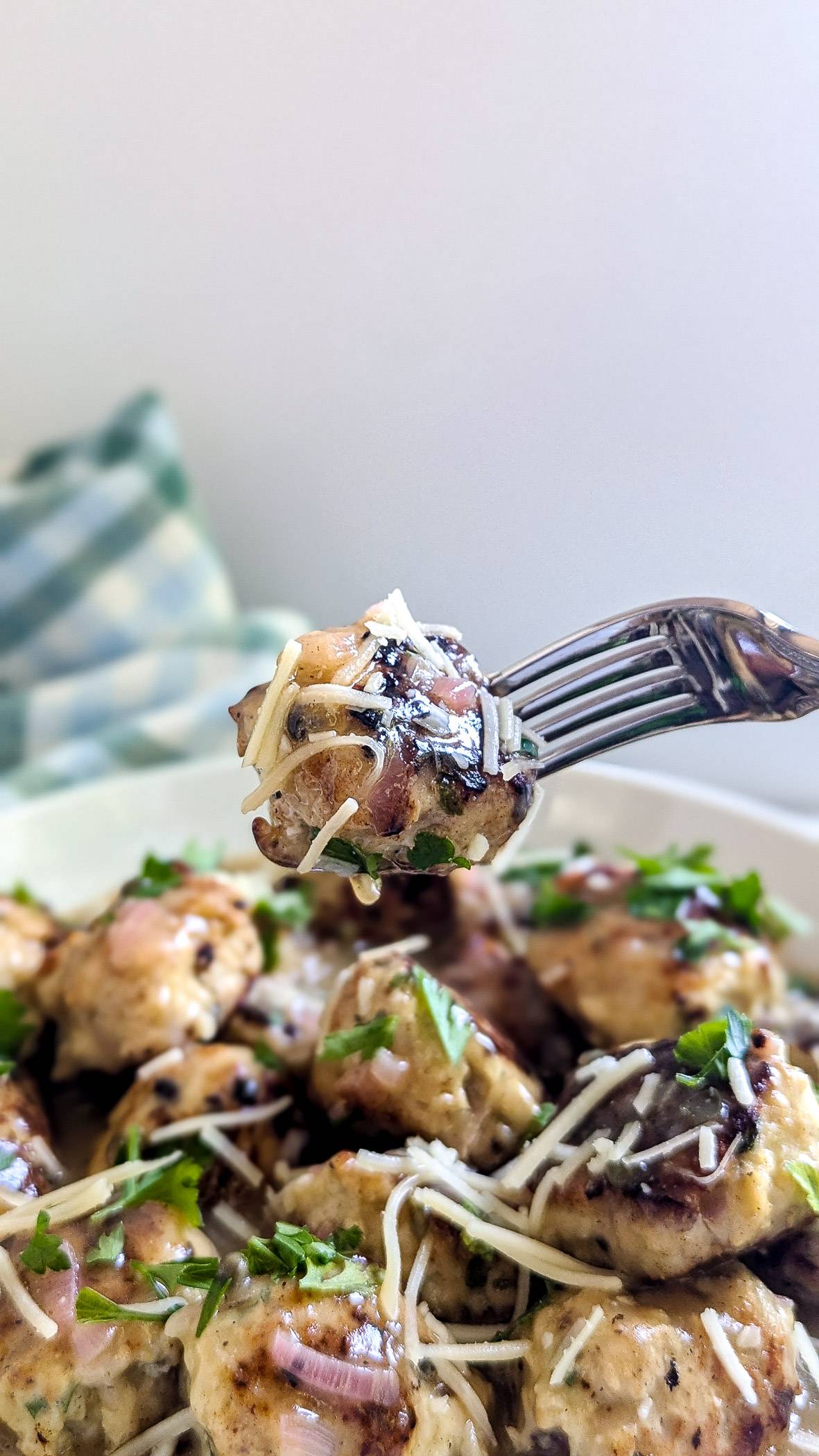 chicken piccata meatball on fork.