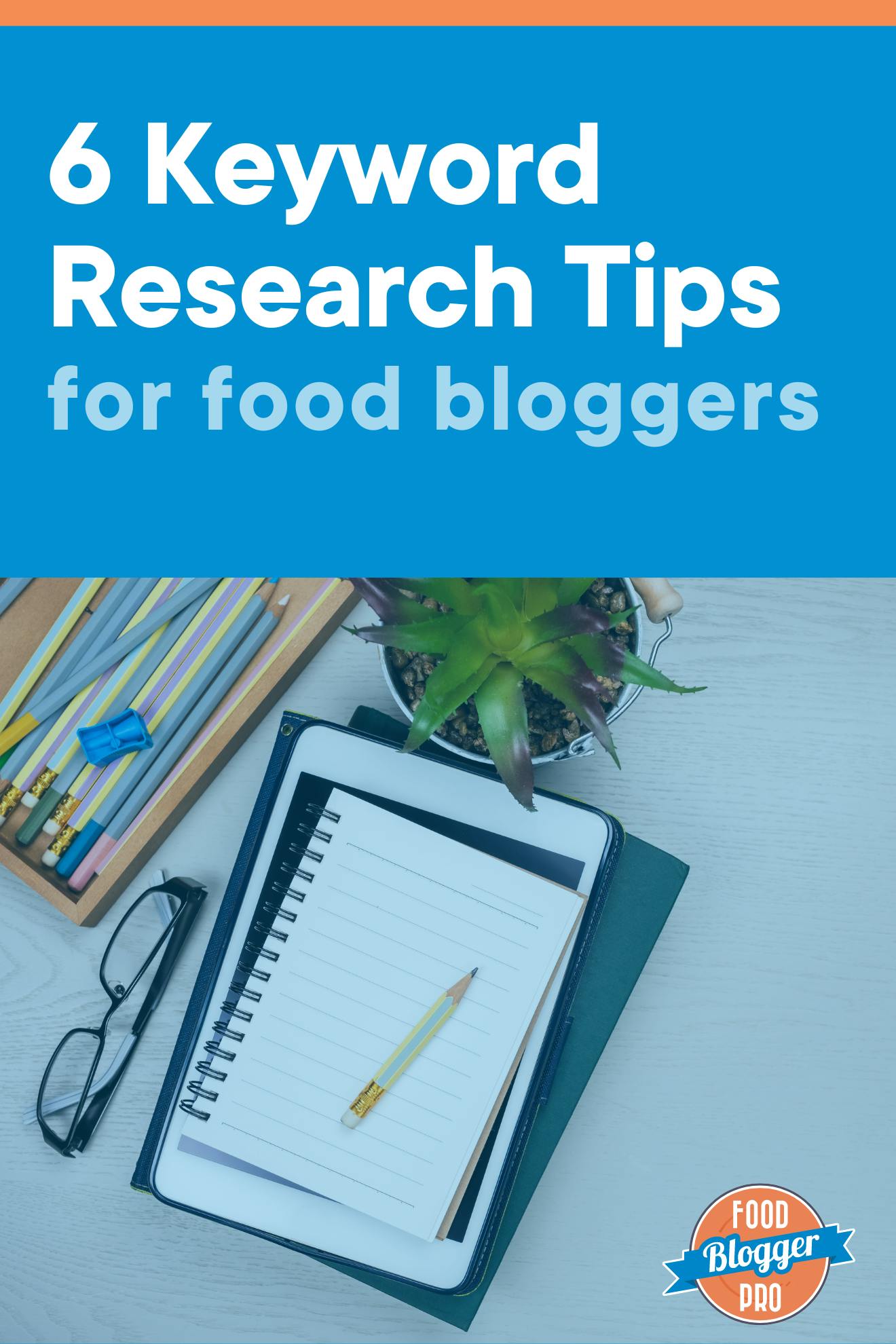 an ipad, a notebook, and writing utensils on a desk with the title of this article, '6 keyword research tips for food bloggers'